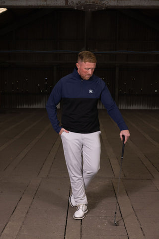 NINE BRIDGES NAVY AND BLACK 1/4 ZIP TOP